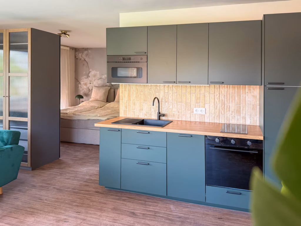 Ferienwohnung Blütenhaus Caputh Küche Schlafzimmer